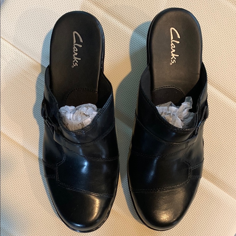 Clarks Black Mules Sleek Leather Design